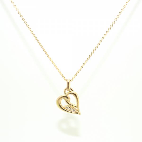 Pendentif coeur en or jaune et ses diamants